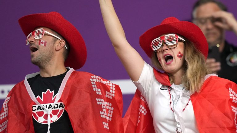 Canadian fans cheer ahead of World Cup action between Canada and Croatia at the Khalifa International Stadium in Al Rayyan, Qatar on Sunday, November 27, 2022. (Nathan Denette/The Canadian Press)