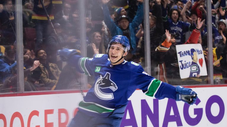 Vancouver Canucks' Andrei Kuzmenko (96) celebrates his third goal against the Anaheim Ducks during the third period of an NHL hockey game in Vancouver on Thursday, November 3, 2022. (Ben Nelms/CP)