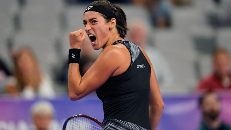 Caroline Garcia of France reacts to scoring a point in the third set against Iga Swiatek of Poland during round-robin play on day six of the WTA Finals tennis tournament in Fort Worth, Texas, Saturday, Nov. 5, 2022. (LM Otero/AP)