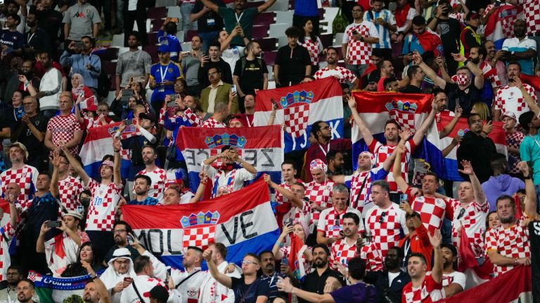 Croatia's soccer team fans celebrate their 4-1 victory over Canada during the World Cup group F soccer at the Khalifa International Stadium in Doha, Qatar, Sunday, Nov. 27, 2022. (Darko Vojinovic/AP)