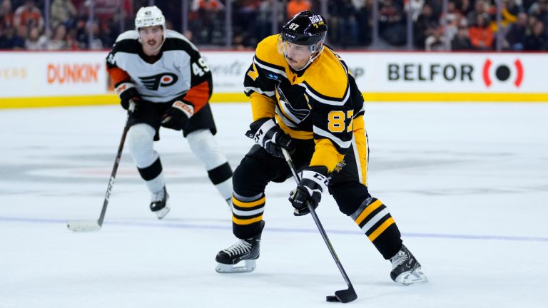 Pittsburgh Penguins' Sidney Crosby skates with the puck during the first period of an NHL hockey game against the Philadelphia Flyers, Friday, Nov. 25, 2022, in Philadelphia. (Matt Slocum/AP)