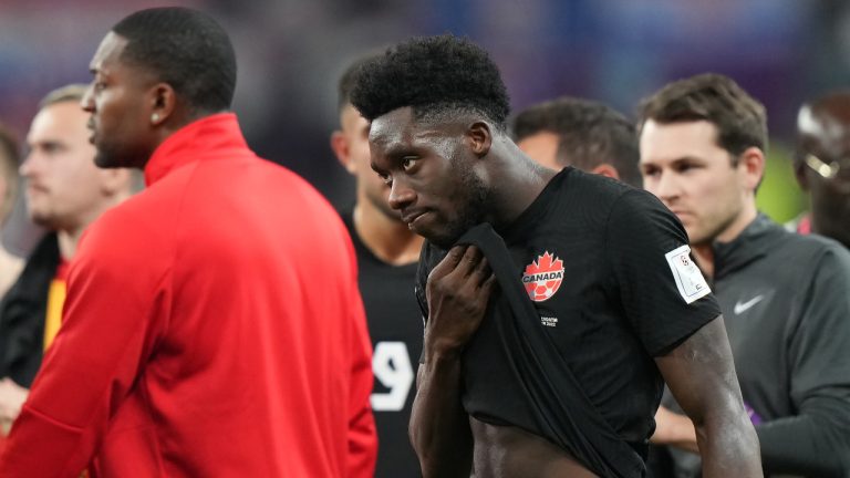 Canada forward Alphonso Davies (19) looks on following Canada's loss to Croatia in group F World Cup soccer action at the Khalifa International Stadium in Al Rayyan, Qatar on Sunday. (Nathan Denette/CP)