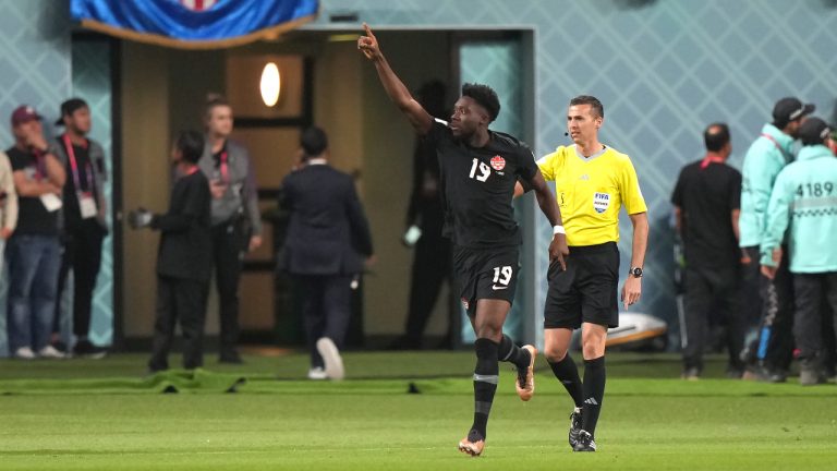 Canada forward Alphonso Davies (19) celebrates his goal against Croatia during first half group F World Cup soccer action at the Khalifa International Stadium in Al Rayyan, Qatar on Sunday. (Nathan Denette/CP)