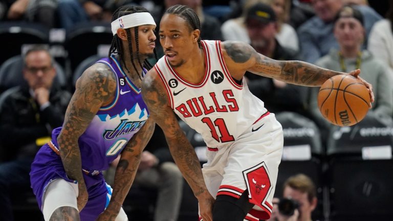 Utah Jazz guard Jordan Clarkson guards Chicago Bulls forward DeMar DeRozan (11) during the first half of an NBA basketball game, Monday, Nov. 28, 2022, in Salt Lake City. (Rick Bowmer/AP Photo)