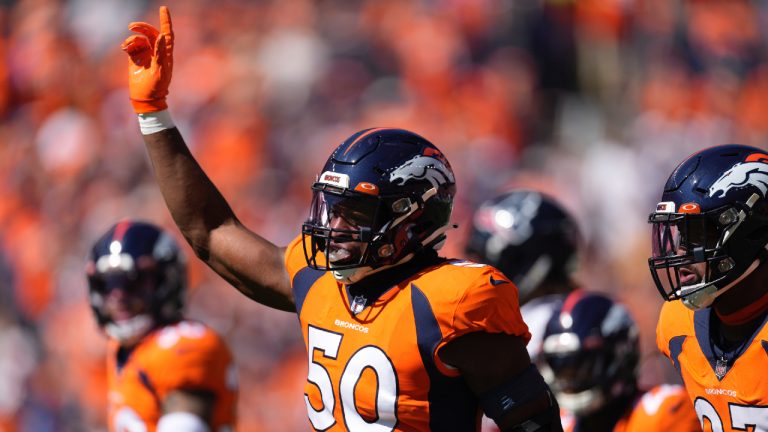 Denver Broncos linebacker Jonas Griffith (50) celebrates a defensive stop against the Houston Texans during the first half of an NFL football game, Sunday, Sept. 18, 2022, in Denver. (David Zalubowski/AP)