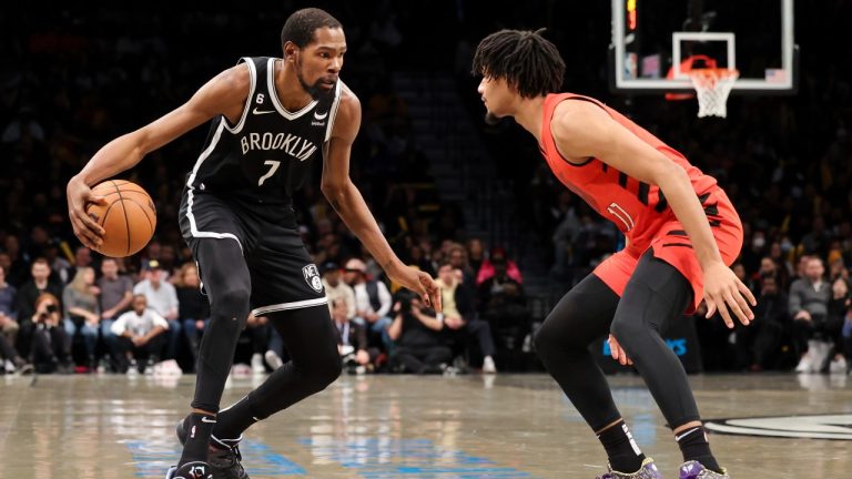 Brooklyn Nets forward Kevin Durant (7) is defended by Portland Trail Blazers guard Shaedon Sharpe during the second half of an NBA basketball game Sunday, Nov. 27, 2022, in New York. (Jessie Alcheh/AP Photo)