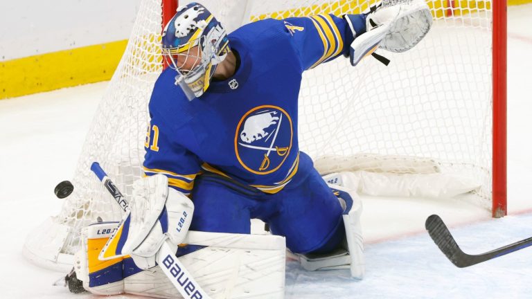 Buffalo Sabres goaltender Eric Comrie (31) makes a save during the third period of an NHL hockey game against the Arizona Coyotes, Tuesday, Nov. 8, 2022, in Buffalo, N.Y. (Jeffrey T. Barnes/AP)