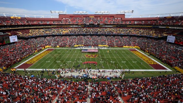 D'Onta Foreman leads Panthers past rival Falcons in rain