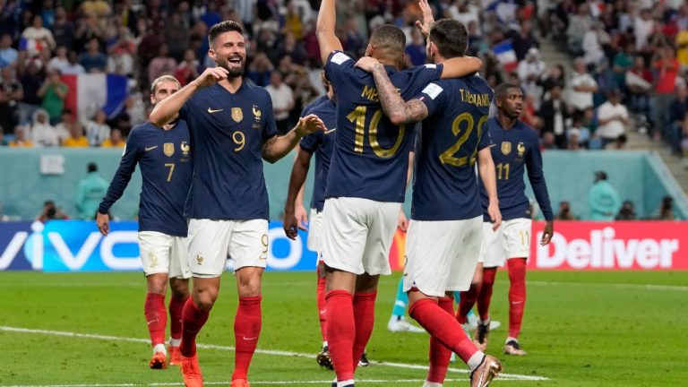 France's Olivier Giroud, 2nd left, celebrates after scoring his side's fourth goal during the World Cup group D soccer match between France and Australia, at the Al Janoub Stadium in Al Wakrah, Qatar, Tuesday, Nov. 22, 2022. (Thanassis Stavrakis/AP)