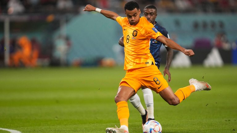 Cody Gakpo of the Netherlands scores the opening goal during the World Cup group A soccer match between Netherlands and Ecuador at the Khalifa International Stadium in Doha, Qatar, Friday, Nov. 25, 2022. (Darko Vojinovic/AP)