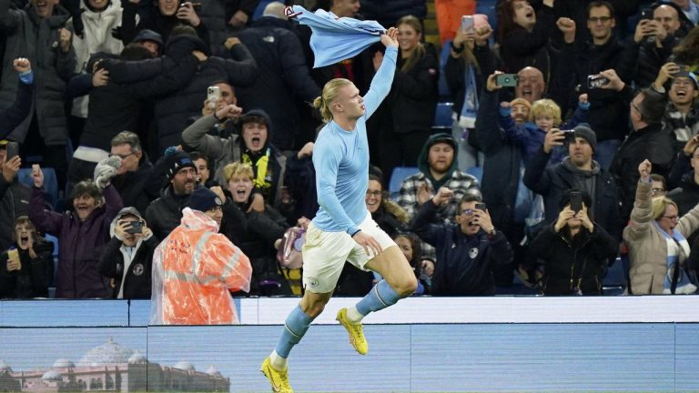 Manchester City's Erling Haaland celebrates after scoring his side's second goal from the penalty spot during the English Premier League soccer match between Manchester City and Fulham at Etihad stadium in Manchester, England, Saturday, Nov. 5, 2022. (Dave Thompson/AP)