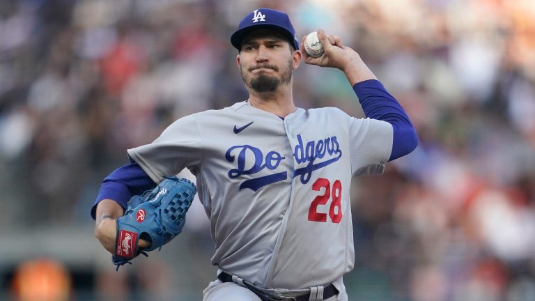 Los Angeles Dodgers' Andrew Heaney pitches against the San Francisco Giants during the first inning of a baseball game in San Francisco, Monday, Aug. 1, 2022. (Jeff Chiu/AP)