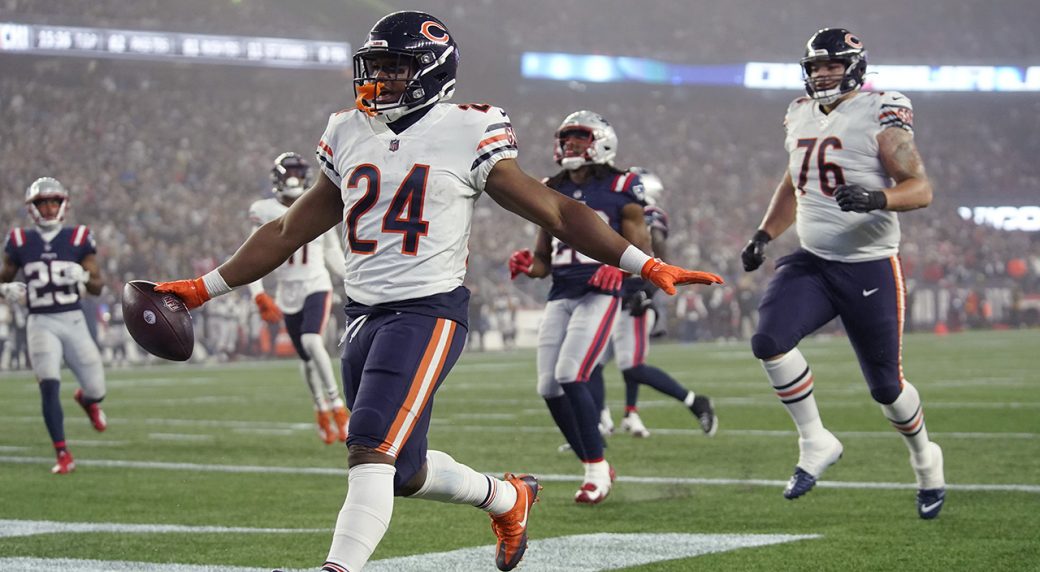 December 24, 2022 - Chicago Bears running back Khalil Herbert (24) fends  off a tackle attempt during