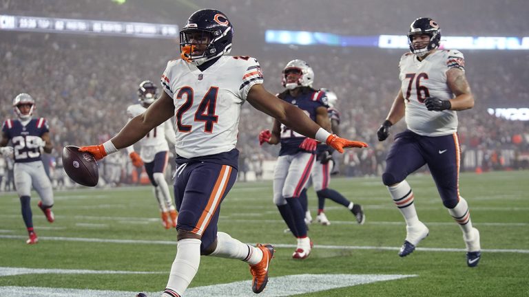 Chicago Bears running back Khalil Herbert celebrates his touchdown against the New England Patriots. (Steven Senne/AP)