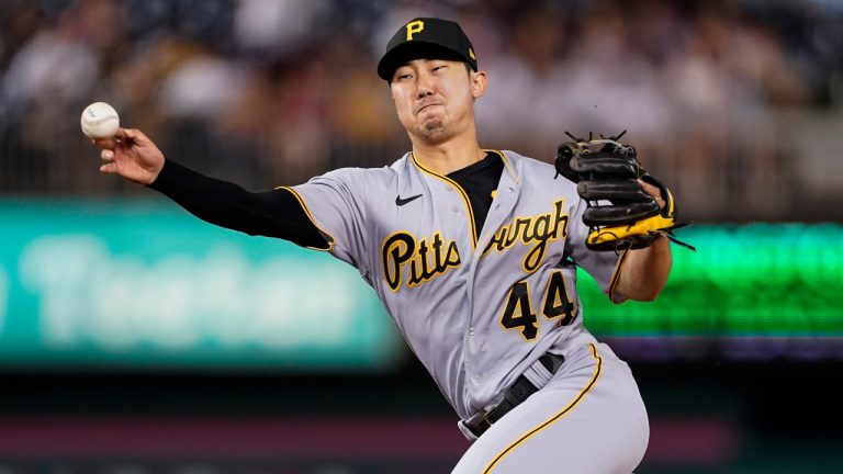 Pittsburgh Pirates second baseman Hoy Park throws to first, but not in time to put out Washington Nationals' Josh Bell during the eighth inning of a baseball game at Nationals Park, Tuesday, June 28, 2022, in Washington. (Alex Brandon/AP)