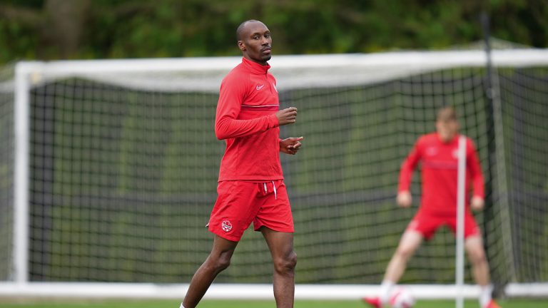 Canadian national men's soccer team midfielder Atiba Hutchinson jogs during a training session for a CONCACAF Nations League match against Curacao, in Vancouver, on Tuesday, June 7, 2022. (Darryl Dyck/CP)