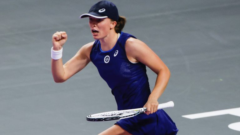 Iga Swiatek, of Poland, celebrates during her match against Caroline Garcia, of France, during round-robin play on day four of the WTA Finals tennis tournament in Fort Worth, Texas, Thursday, Nov. 3, 2022. (Ron Jenkins/AP)