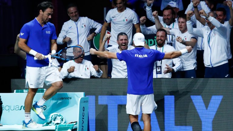 Italy's Fabio Fognini, left, celebrates after defeating, together with Simone Bolelli, after defeating Tommy Paul and Jack Sock of the USA in a Davis Cup quarter-final tennis match between Italy and USA in Malaga, Spain, Thursday, Nov. 24, 2022. (Joan Monfort/AP)