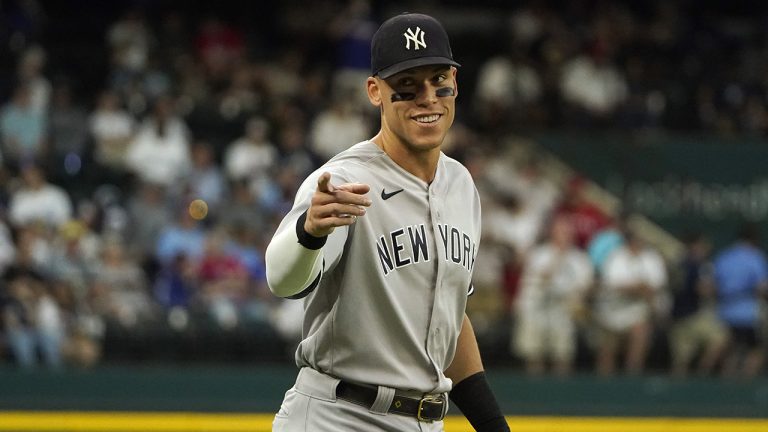 New York Yankees' Aaron Judge points to fans during warm ups before a game against the Texas Rangers in Arlington, Texas on Tuesday, Oct. 4, 2022. (LM Otero/AP)