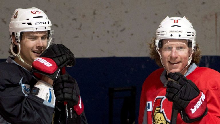 Ottawa Senators defenceman Erik Karlsson (65) and right winger Daniel Alfredsson (11) watch the team's practice Wednesday, May 1, 2013 in Montreal. Aldfredsson is set to be inducted into the Hockey Hall of Fame on Monday, Nov. 14 (Ryan Remiorz/The Canadian Press)