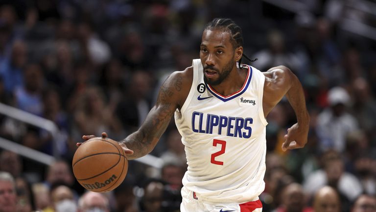 Los Angeles Clippers forward Kawhi Leonard dribbles down the court during the first half of a preseason NBA basketball game against the Minnesota Timberwolves, Oct. 9, 2022. (Raul Romero Jr./AP)