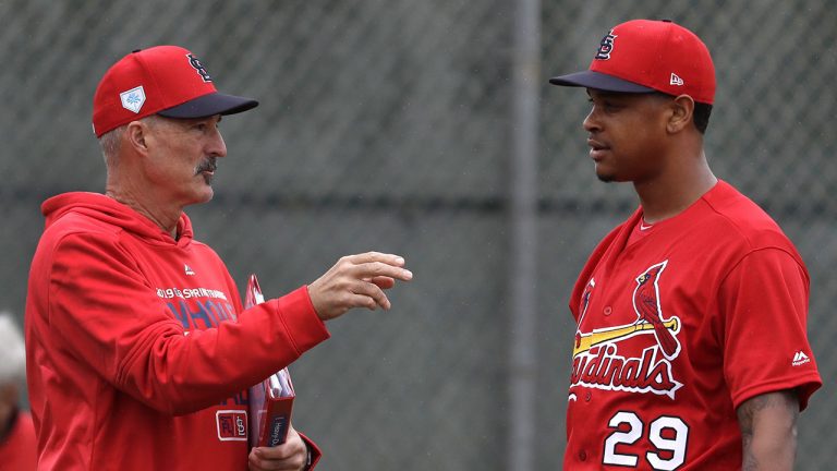 Former St. Louis Cardinals pitching coach Mike Maddux, left, talks with pitcher Alex Reyes during spring training baseball practice Wednesday, Feb. 13, 2019, in Jupiter, Fla. (Jeff Roberson/AP)