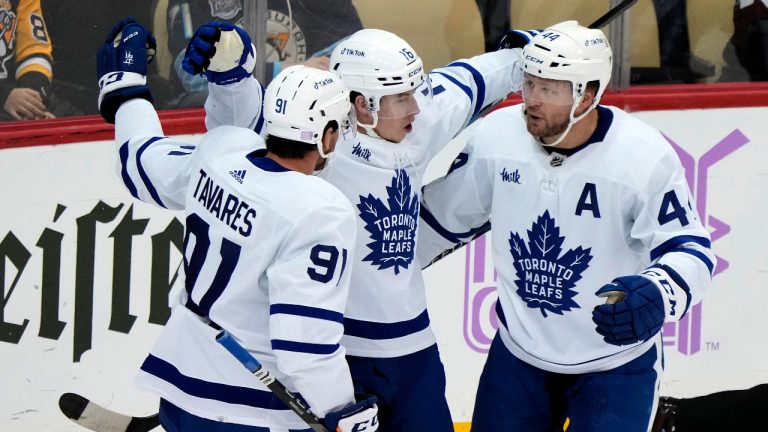 Toronto Maple Leafs' Mitchell Marner (16) celebrates his goal during the first period of the team's NHL hockey game against the Pittsburgh Penguins in Pittsburgh. (Gene J. Puskar/AP)