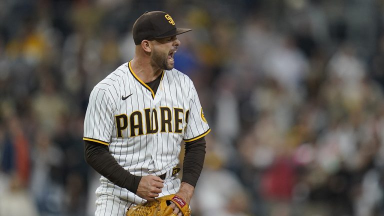 San Diego Padres relief pitcher Nick Martinez reacts after getting the last out against the San Francisco Giants, Tuesday, Oct. 4, 2022, in San Diego.  (Gregory Bull/AP)