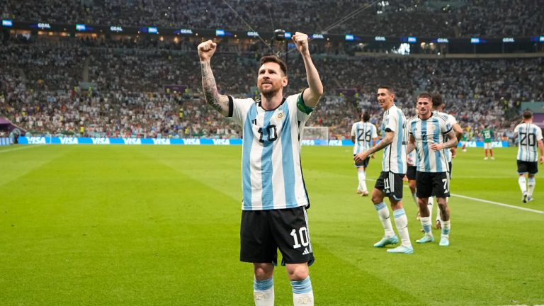 Argentina's Lionel Messi celebrates after scoring his side's opening goal during the World Cup group C soccer match between Argentina and Mexico, at the Lusail Stadium in Lusail, Qatar, Saturday, Nov. 26, 2022. (Ariel Schalit/AP)