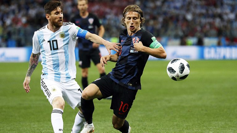 Lionel Messi and Luka Modric go head-to-head during an Argentina-Croatia match at the 2018 World Cup. (Petr David Josek/AP)