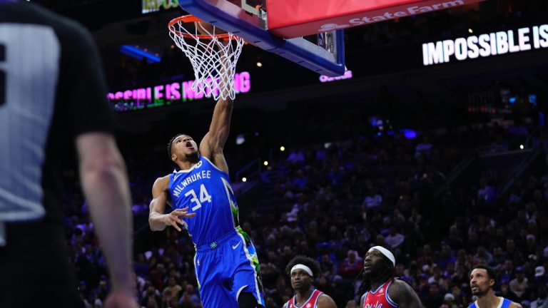 Milwaukee Bucks' Giannis Antetokounmpo goes up for a dunk during the second half of an NBA basketball game against the Philadelphia 76ers, Friday, Nov. 18, 2022, in Philadelphia. (Matt Slocum/AP)