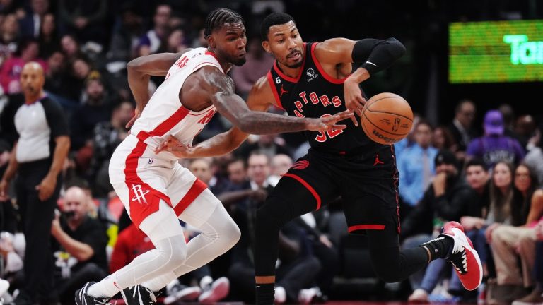 Houston Rockets forward Tari Eason (17) and Toronto Raptors forward Otto Porter Jr. (32) battle for the ball during second half NBA basketball action in Toronto on Wednesday, November 9, 2022. (Nathan Denette/CP)