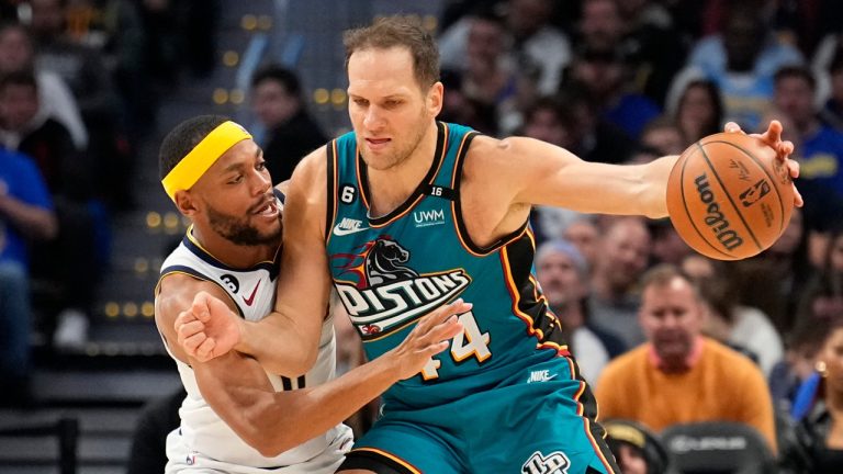 Denver Nuggets forward Bruce Brown pressures Detroit Pistons forward Bojan Bogdanovic. during the third quarter of an NBA basketball game, Tuesday, Nov. 22, 2022, in Denver. (Jack Dempsey/AP)