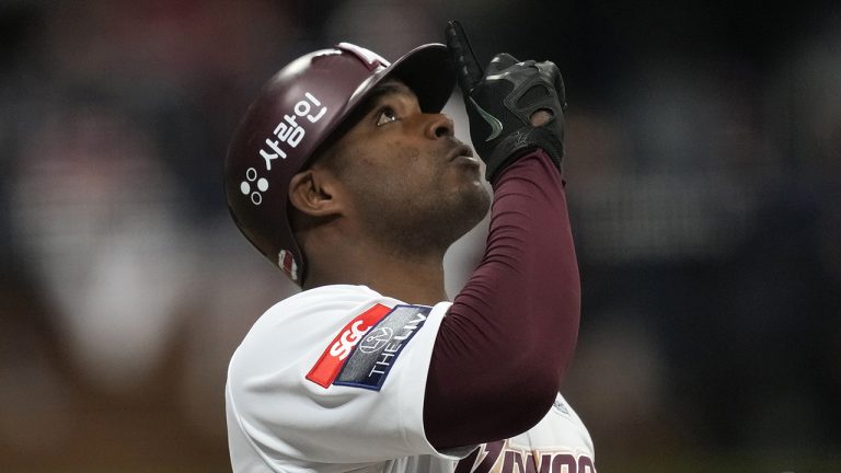 Former Major League Baseball outfielder Yasiel Puig of Kiwoom Heroes gestures during the opening game of the 2022 regular season for the Korea Baseball Organization at Gocheok Sky Dome in Seoul, South Korea, Saturday, April 2, 2022. (Lee Jin-man/AP)