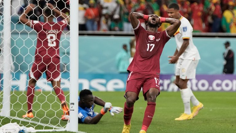 Qatar's Ismail Mohamad reacts after his shot is stopped by Senegal's goalkeeper Edouard Mendy during the World Cup group A soccer match between Qatar and Senegal, at the Al Thumama Stadium in Doha, Qatar, Friday, Nov. 25, 2022. (Hassan Ammar/AP Photo)