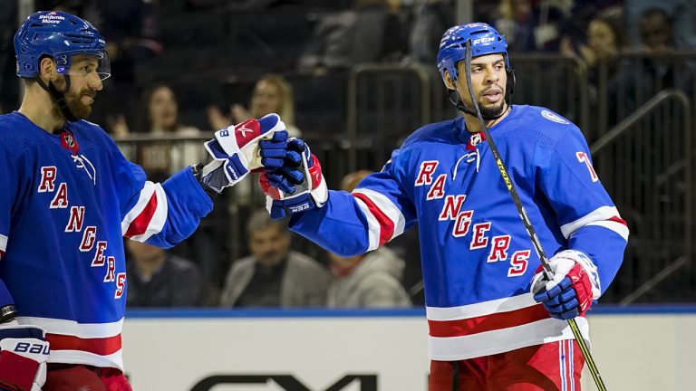 New York Rangers right wing Ryan Reaves (75) celebrates after scoring on Montreal Canadiens goaltender Sam Montembeault (35) during the second period of an NHL hockey game, Wednesday, April 27, 2022, in New York. (John Minchillo/AP)