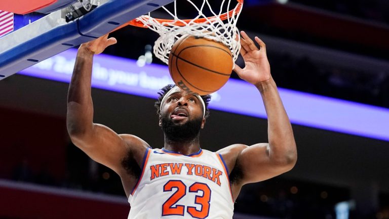 New York Knicks centre Mitchell Robinson dunks during the second half of an NBA basketball game against the Detroit Pistons, Tuesday, Nov. 29, 2022, in Detroit. (Carlos Osorio/AP Photo)