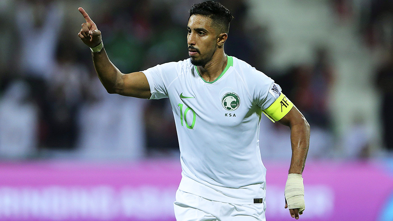 Saudi Arabia's midfielder Salem al Dawsari celebrates after scoring during an AFC Asian Cup Group E soccer match against North Korea. (Kamran Jebreili/AP)