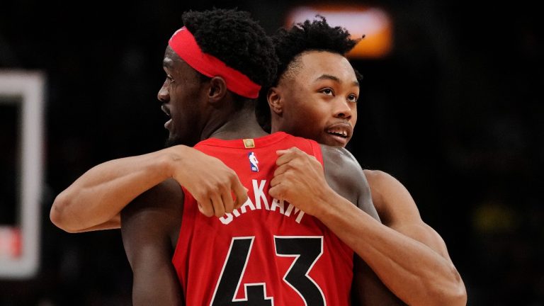 Toronto Raptors forward Pascal Siakam (43) and forward Scottie Barnes (4) celebrate a basket against the Philadelphia 76ers during second half NBA basketball action in Toronto on Wednesday, October 26, 2022. (Frank Gunn/CP)