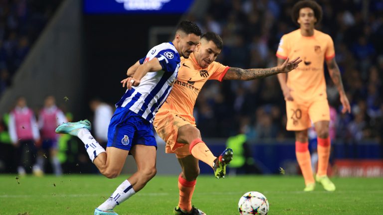 Atletico Madrid's Angel Correa, right, challenges for the ball with Porto's Stephen Eustaquio during a Champions League group B soccer match between FC Porto and Atletico Madrid at the Dragao stadium in Porto, Portugal, Tuesday, Nov. 1, 2022. (Luis Vieira/AP)