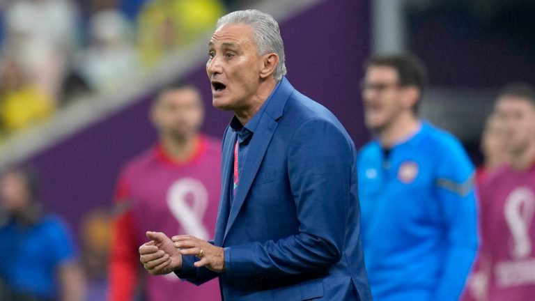 Brazil's head coach Tite stands by the touchline during the World Cup group G soccer match between Brazil and Serbia, at the Lusail Stadium in Lusail, Qatar, Thursday, Nov. 24, 2022. (Andre Penner/AP)