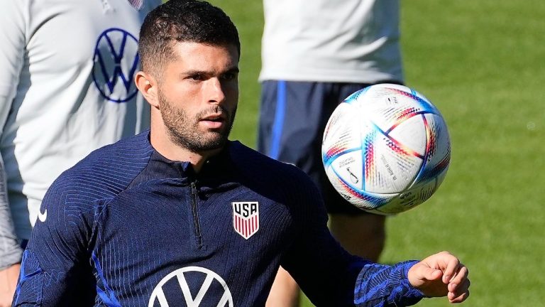 Christian Pulisic exercises during a training session of the US soccer team in Cologne, Germany, prior to a friendly match against Japan, Thursday, Sept. 22, 2022. Now in Qatar, the team has decided to outfit their training facility with a seven-coloured rainbow. (Martin Meissner/AP Photo)