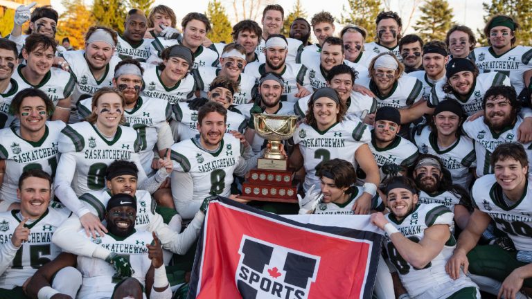 Members of the University of Saskatchewan Huskies football team celebrate winning the U Sports national semifinal Uteck Bowl against the St. Francis Xavier X-Men in Antigonish, N.S., Saturday, Nov. 19, 2022. (Darren Calabrese/CP)