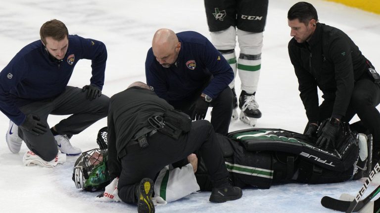 Dallas Stars goaltender Scott Wedgewood is attended to after a play during the second period of an NHL hockey game against the Florida Panthers, Thursday, Nov. 17, 2022, in Sunrise, Fla. (Wilfredo Lee/AP)