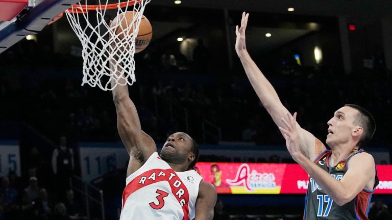 Toronto Raptors forward O.G. Anunoby (3) goes to the basket in front of Oklahoma City Thunder forward Aleksej Pokusevski (17) during the first half of an NBA basketball game Friday, Nov. 11, 2022, in Oklahoma City. (Sue Ogrocki/AP Photo)