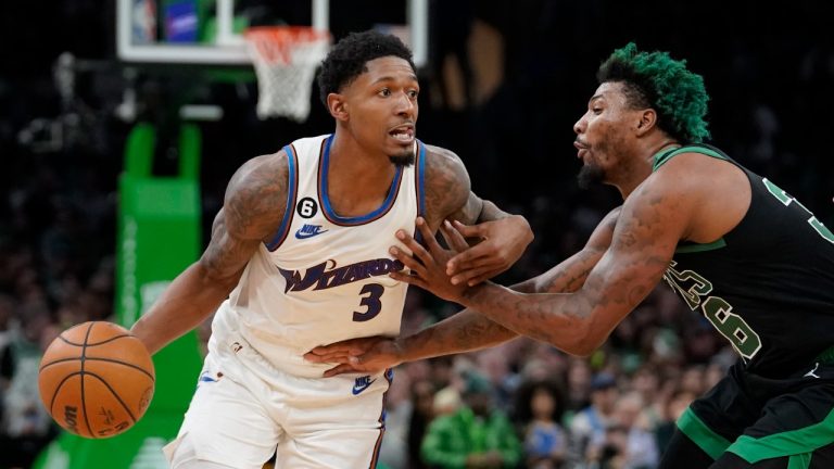 Washington Wizards guard Bradley Beal (3) tries to drive past Boston Celtics guard Marcus Smart, right, in the second half of an NBA basketball game, Sunday, Oct. 30, 2022, in Boston. (Steven Senne/AP)