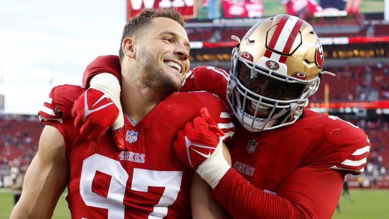 San Francisco 49ers defensive end Nick Bosa (97) celebrates with offensive tackle Trent Williams after the 49ers defeated the New Orleans Saints in an NFL football game in Santa Clara, Calif., Sunday, Nov. 27, 2022. (AP Photo/Jed Jacobsohn)