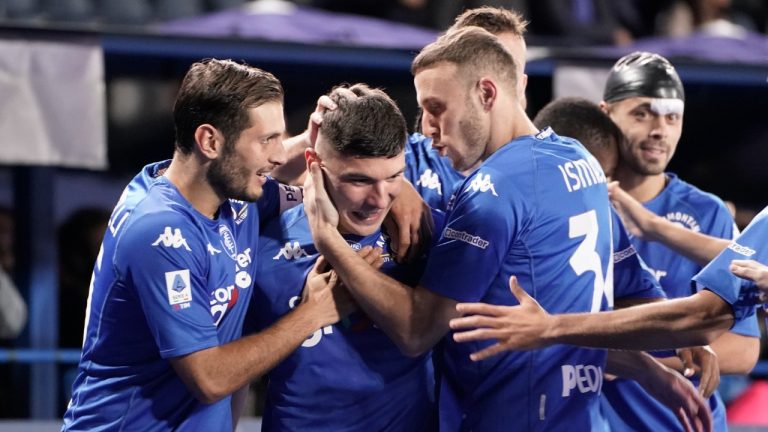 Empoli's Nicolo Cambiaghi celebrates scoring with teammates during the Serie A soccer match between Empoli and Cremonese at Castellani Stadium. Empoli, Italy, Friday Nov. 11, 2022. (Marco Bucco/LaPresse via AP)