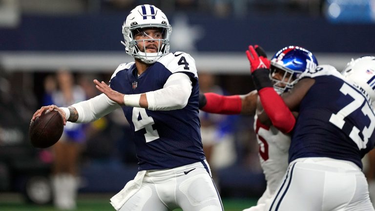 Dallas Cowboys quarterback Dak Prescott (4) throws a pass against the New York Giants during the first half of an NFL football game. (Tony Gutierrez/AP)