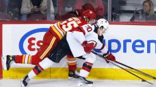 Sutter benches underperforming Flames players in OT loss to Devils